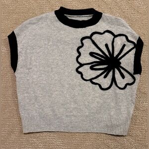Gray Sleeveless Sweater with Black Floral Design